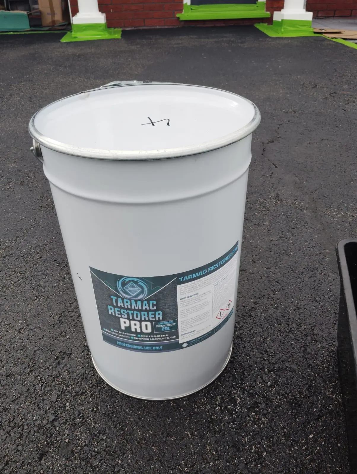 25 litre tub of professional tarmac restorer ready for application